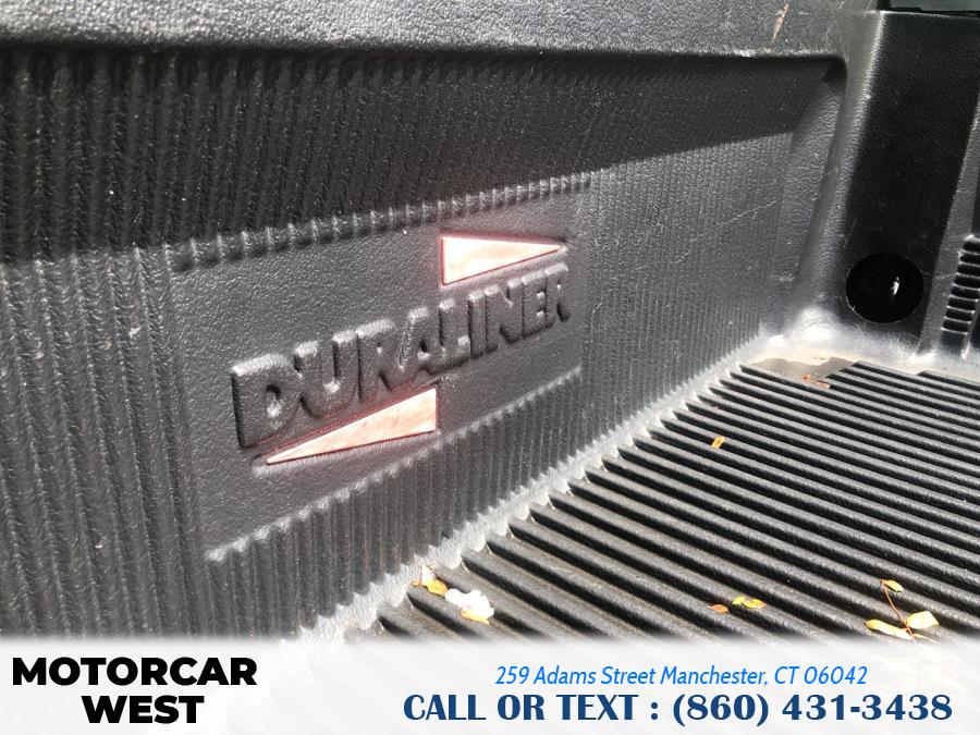 Used Ram 1500 4WD Quad Cab 140.5" SLT 2012 | Motorcar West. Manchester, Connecticut Used Ram 1500 4WD Quad Cab 140.5" SLT 2012 | Motorcar West. Manchester, Connecticut