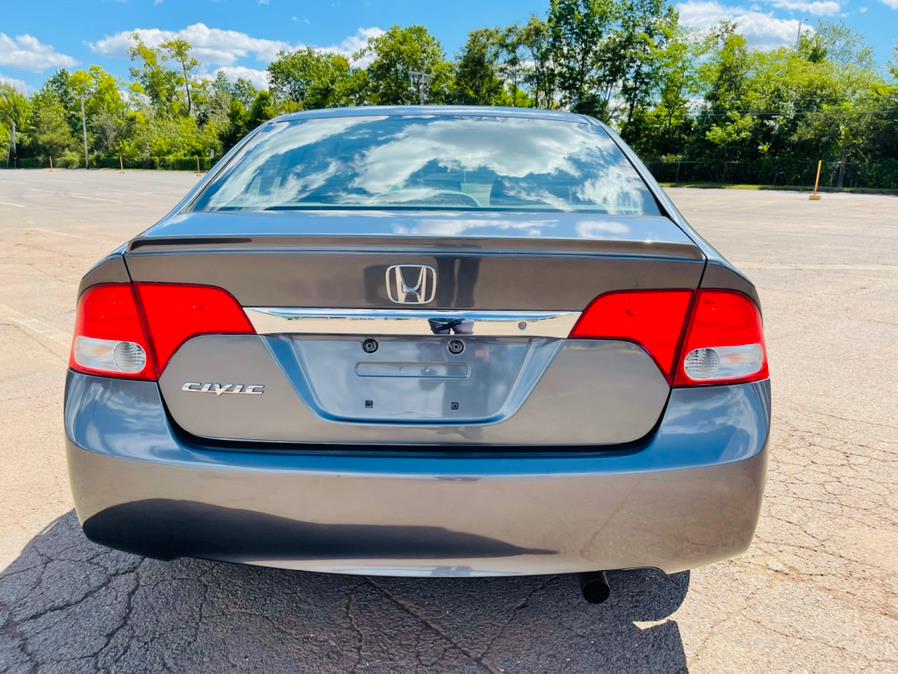 2010 Honda Civic Sdn 4dr Auto DX-G, available for sale in New Britain, Connecticut | Supreme Automotive. New Britain, Connecticut 2010 Honda Civic Sdn 4dr Auto DX-G, available for sale in New Britain, Connecticut | Supreme Automotive. New Britain, Connecticut