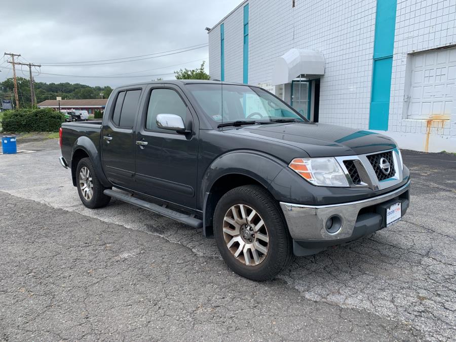 Used Nissan Frontier 4WD Crew Cab SWB Auto SLL 2013 | Dealertown Auto Wholesalers. Milford, Connecticut Used Nissan Frontier 4WD Crew Cab SWB Auto SLL 2013 | Dealertown Auto Wholesalers. Milford, Connecticut