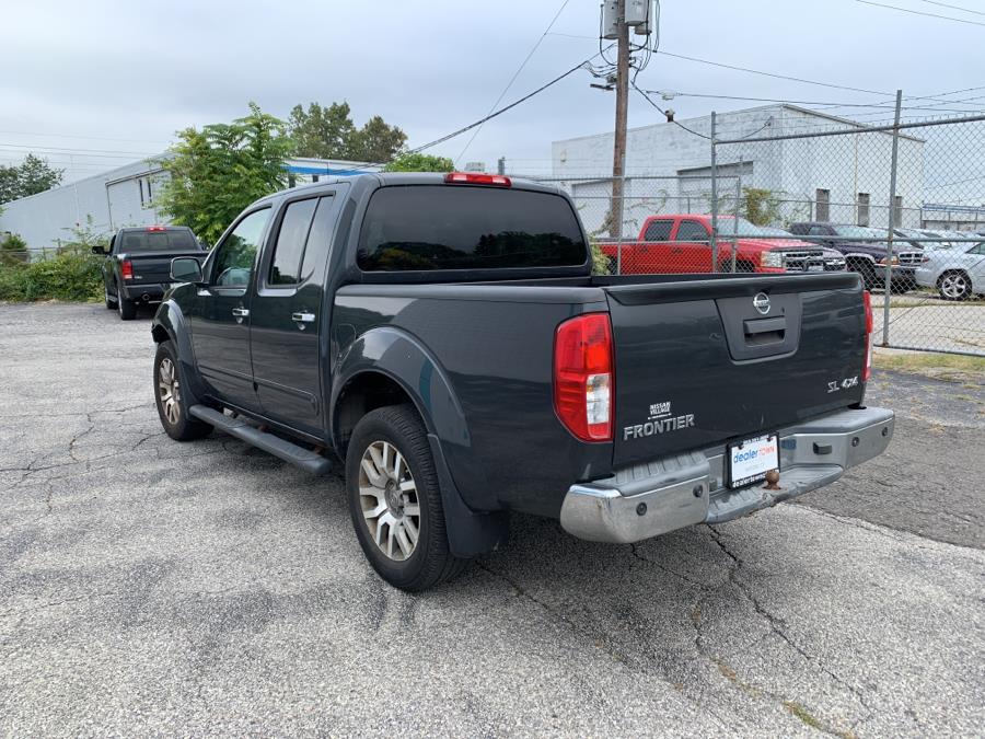 Used Nissan Frontier 4WD Crew Cab SWB Auto SLL 2013 | Dealertown Auto Wholesalers. Milford, Connecticut Used Nissan Frontier 4WD Crew Cab SWB Auto SLL 2013 | Dealertown Auto Wholesalers. Milford, Connecticut