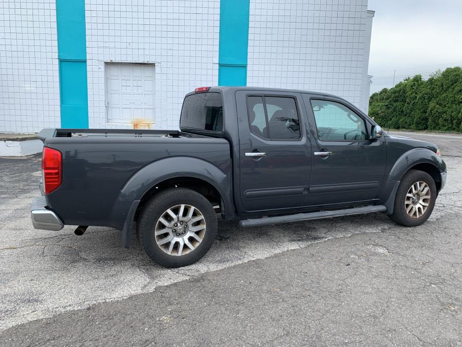 Used Nissan Frontier 4WD Crew Cab SWB Auto SLL 2013 | Dealertown Auto Wholesalers. Milford, Connecticut Used Nissan Frontier 4WD Crew Cab SWB Auto SLL 2013 | Dealertown Auto Wholesalers. Milford, Connecticut