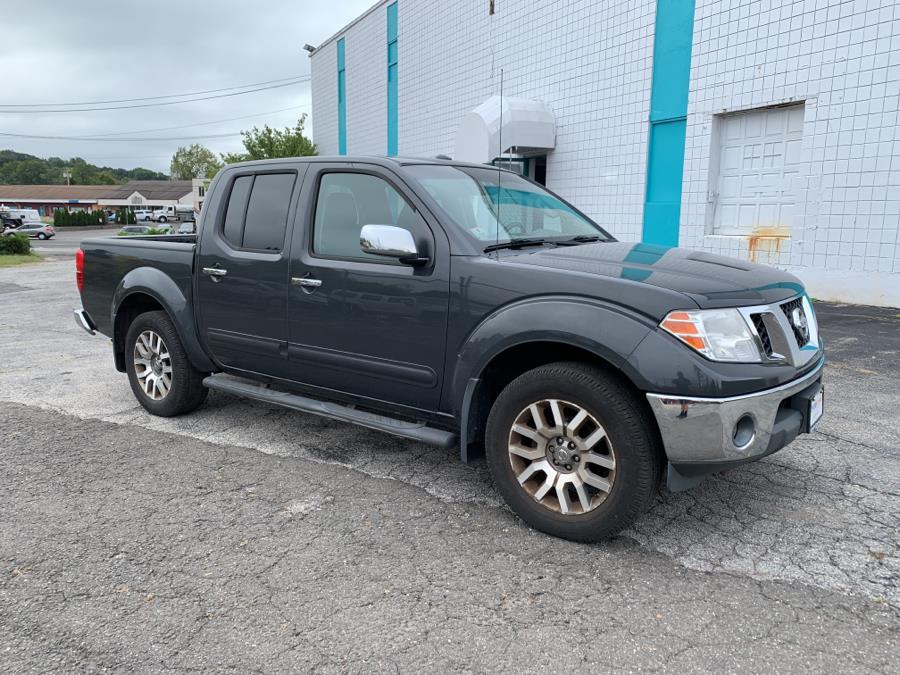 Used Nissan Frontier 4WD Crew Cab SWB Auto SLL 2013 | Dealertown Auto Wholesalers. Milford, Connecticut Used Nissan Frontier 4WD Crew Cab SWB Auto SLL 2013 | Dealertown Auto Wholesalers. Milford, Connecticut