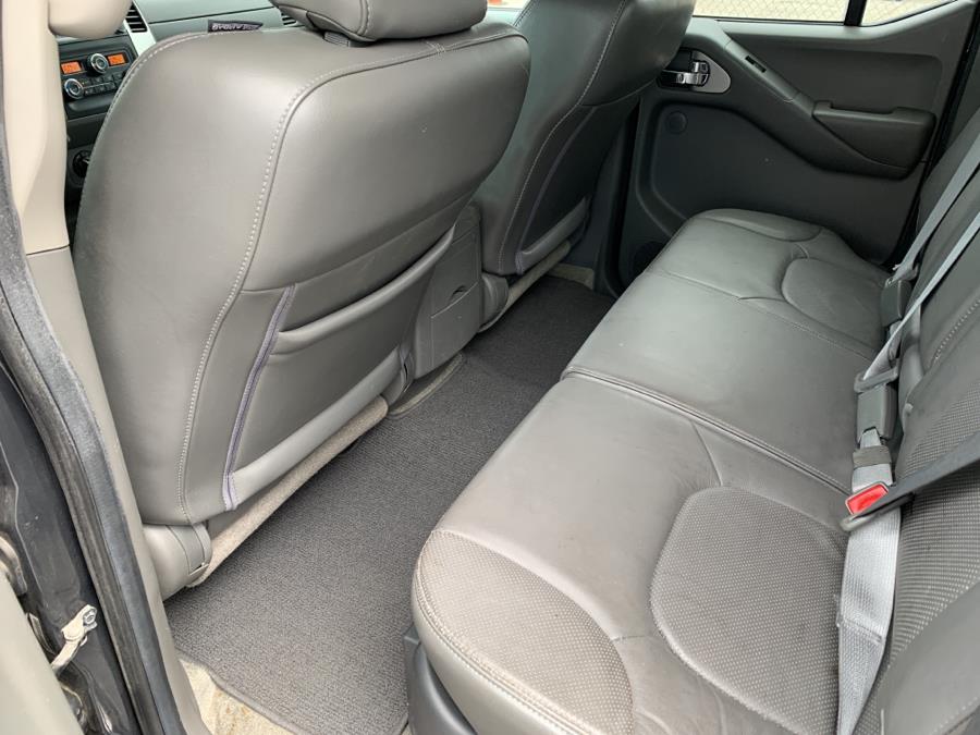 Used Nissan Frontier 4WD Crew Cab SWB Auto SLL 2013 | Dealertown Auto Wholesalers. Milford, Connecticut Used Nissan Frontier 4WD Crew Cab SWB Auto SLL 2013 | Dealertown Auto Wholesalers. Milford, Connecticut