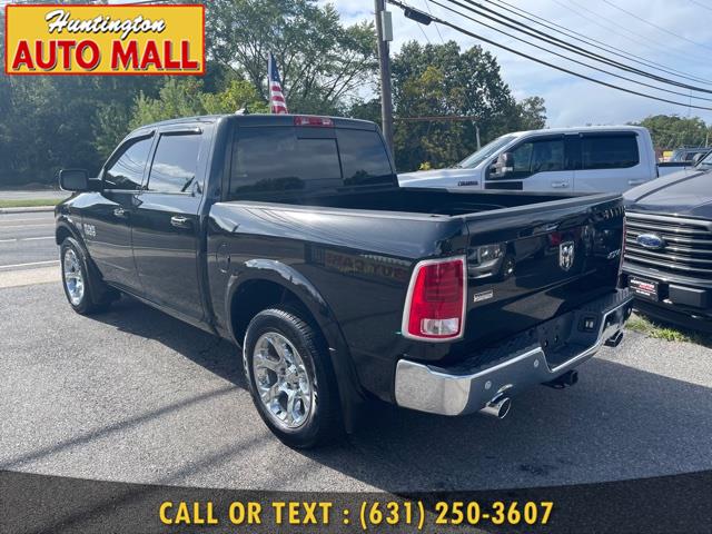 Used Ram 1500 4WD Crew Cab 140.5" Laramie 2015 | Huntington Auto Mall. Huntington Station, New York Used Ram 1500 4WD Crew Cab 140.5" Laramie 2015 | Huntington Auto Mall. Huntington Station, New York