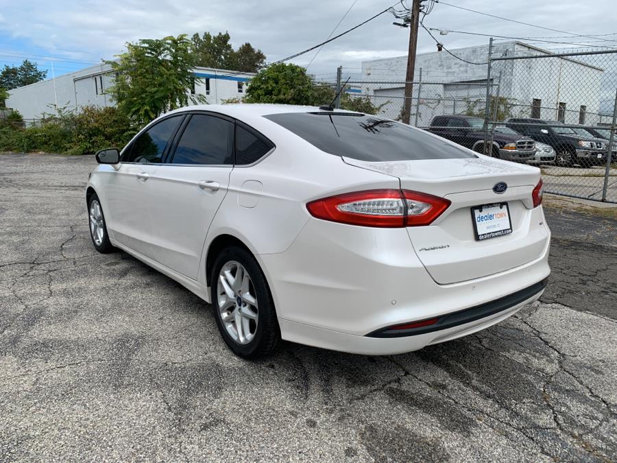 2016 Ford Fusion 4dr Sdn SE FWD, available for sale in Milford, Connecticut | Dealertown Auto Wholesalers. Milford, Connecticut 2016 Ford Fusion 4dr Sdn SE FWD, available for sale in Milford, Connecticut | Dealertown Auto Wholesalers. Milford, Connecticut
