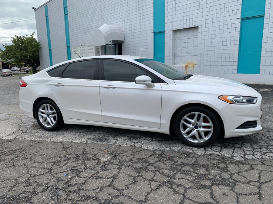 2016 Ford Fusion 4dr Sdn SE FWD, available for sale in Milford, Connecticut | Dealertown Auto Wholesalers. Milford, Connecticut 2016 Ford Fusion 4dr Sdn SE FWD, available for sale in Milford, Connecticut | Dealertown Auto Wholesalers. Milford, Connecticut