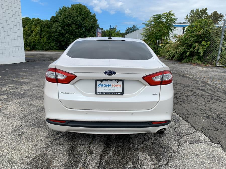 2016 Ford Fusion 4dr Sdn SE FWD, available for sale in Milford, Connecticut | Dealertown Auto Wholesalers. Milford, Connecticut 2016 Ford Fusion 4dr Sdn SE FWD, available for sale in Milford, Connecticut | Dealertown Auto Wholesalers. Milford, Connecticut