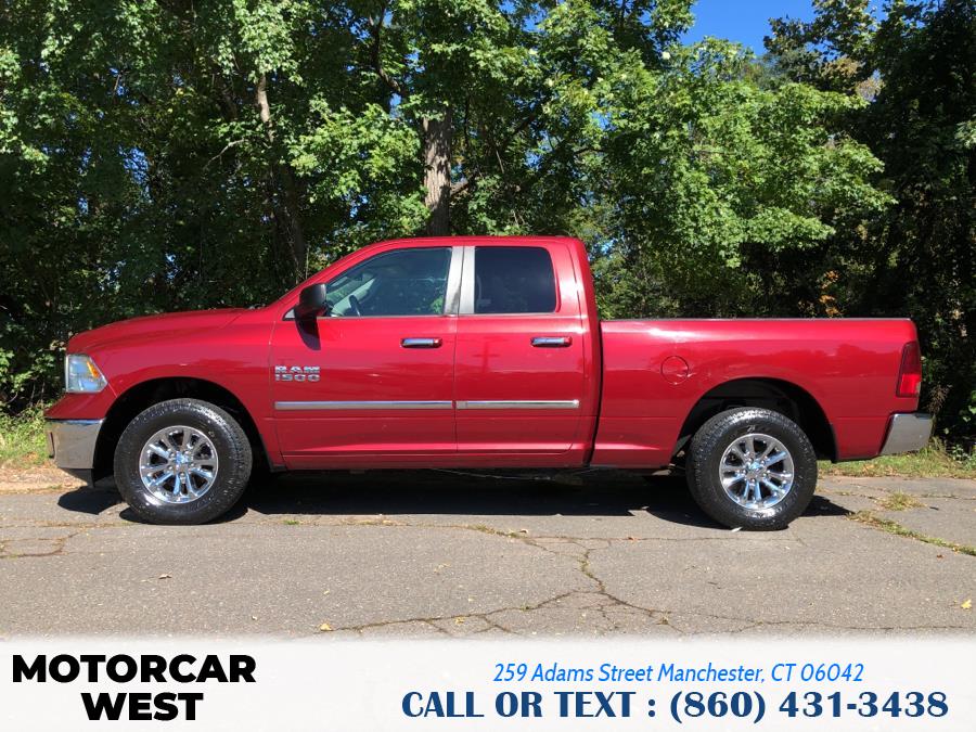 2014 Ram 1500 4WD Quad Cab 140.5" Outdoorsman, available for sale in Manchester, Connecticut | Motorcar West. Manchester, Connecticut 2014 Ram 1500 4WD Quad Cab 140.5" Outdoorsman, available for sale in Manchester, Connecticut | Motorcar West. Manchester, Connecticut