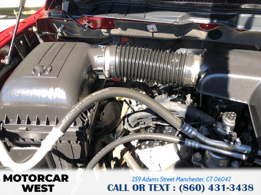 2014 Ram 1500 4WD Quad Cab 140.5" Outdoorsman, available for sale in Manchester, Connecticut | Motorcar West. Manchester, Connecticut 2014 Ram 1500 4WD Quad Cab 140.5" Outdoorsman, available for sale in Manchester, Connecticut | Motorcar West. Manchester, Connecticut