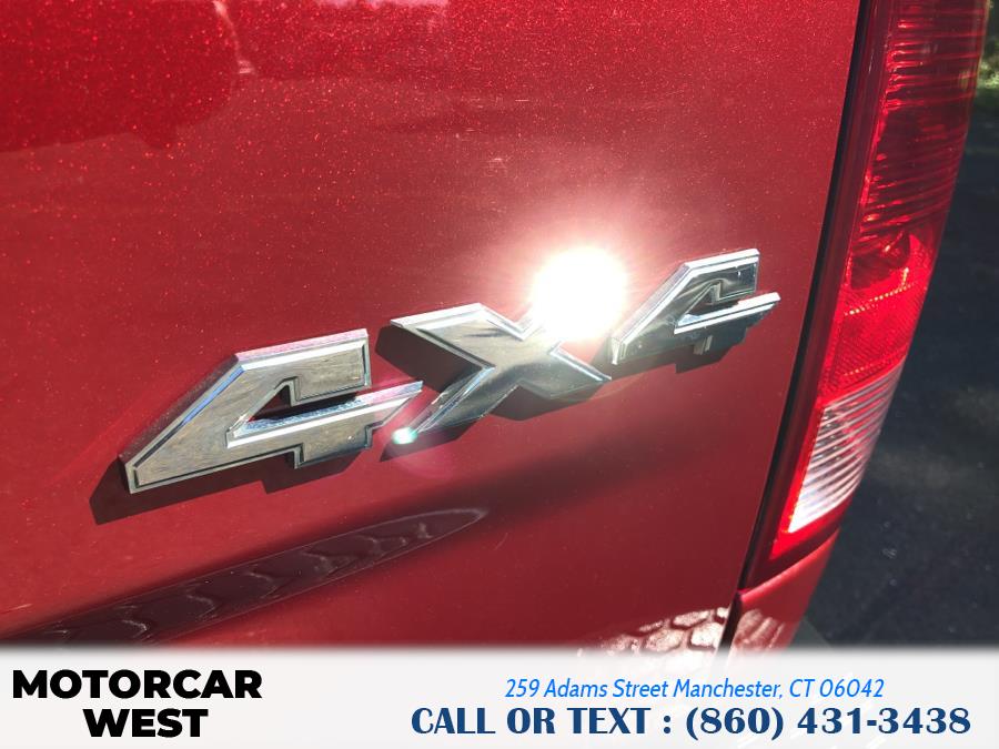 2014 Ram 1500 4WD Quad Cab 140.5" Outdoorsman, available for sale in Manchester, Connecticut | Motorcar West. Manchester, Connecticut 2014 Ram 1500 4WD Quad Cab 140.5" Outdoorsman, available for sale in Manchester, Connecticut | Motorcar West. Manchester, Connecticut