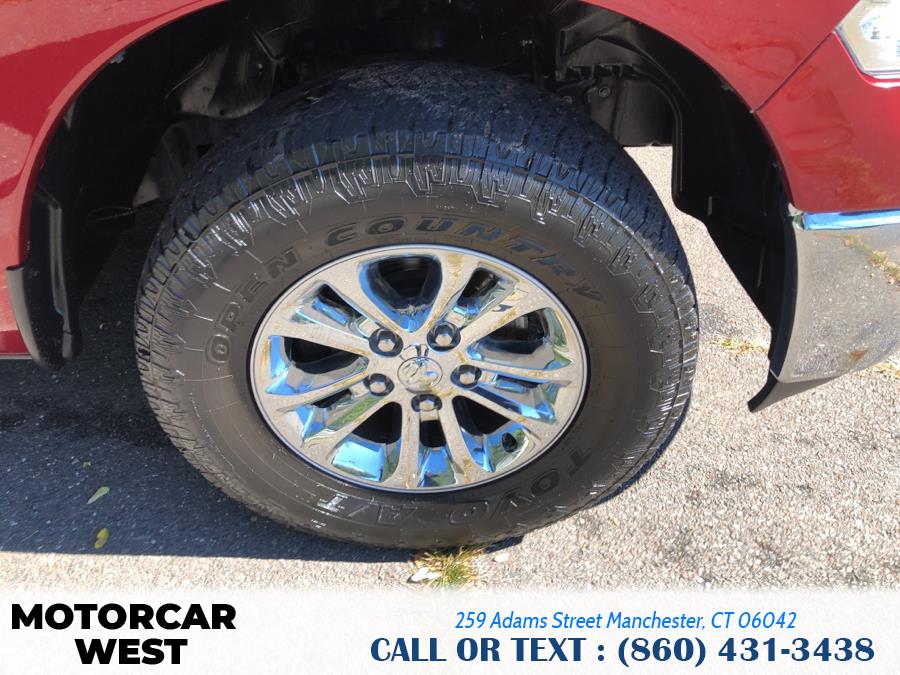 2014 Ram 1500 4WD Quad Cab 140.5" Outdoorsman, available for sale in Manchester, Connecticut | Motorcar West. Manchester, Connecticut 2014 Ram 1500 4WD Quad Cab 140.5" Outdoorsman, available for sale in Manchester, Connecticut | Motorcar West. Manchester, Connecticut