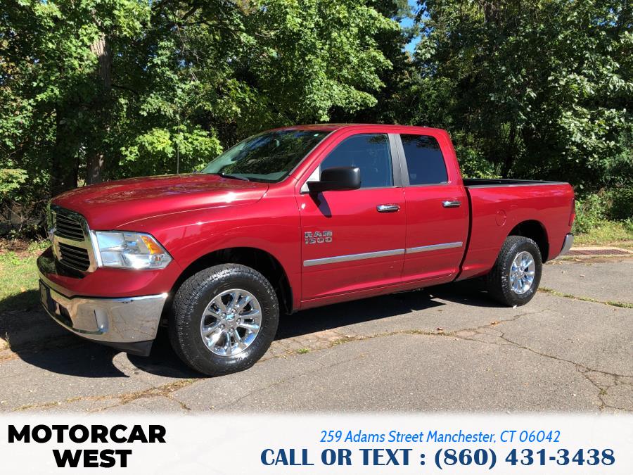 2014 Ram 1500 4WD Quad Cab 140.5" Outdoorsman, available for sale in Manchester, Connecticut | Motorcar West. Manchester, Connecticut 2014 Ram 1500 4WD Quad Cab 140.5" Outdoorsman, available for sale in Manchester, Connecticut | Motorcar West. Manchester, Connecticut