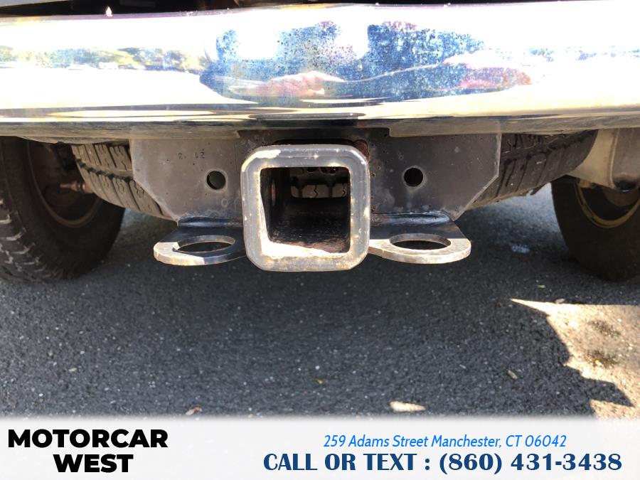 2014 Ram 1500 4WD Quad Cab 140.5" Outdoorsman, available for sale in Manchester, Connecticut | Motorcar West. Manchester, Connecticut 2014 Ram 1500 4WD Quad Cab 140.5" Outdoorsman, available for sale in Manchester, Connecticut | Motorcar West. Manchester, Connecticut