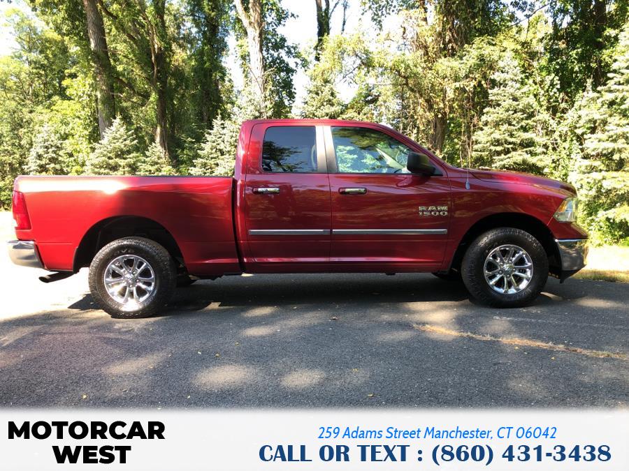2014 Ram 1500 4WD Quad Cab 140.5" Outdoorsman, available for sale in Manchester, Connecticut | Motorcar West. Manchester, Connecticut 2014 Ram 1500 4WD Quad Cab 140.5" Outdoorsman, available for sale in Manchester, Connecticut | Motorcar West. Manchester, Connecticut