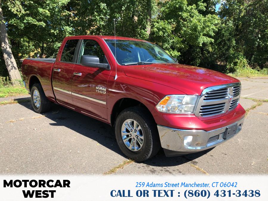 2014 Ram 1500 4WD Quad Cab 140.5" Outdoorsman, available for sale in Manchester, Connecticut | Motorcar West. Manchester, Connecticut 2014 Ram 1500 4WD Quad Cab 140.5" Outdoorsman, available for sale in Manchester, Connecticut | Motorcar West. Manchester, Connecticut