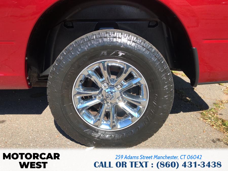 2014 Ram 1500 4WD Quad Cab 140.5" Outdoorsman, available for sale in Manchester, Connecticut | Motorcar West. Manchester, Connecticut 2014 Ram 1500 4WD Quad Cab 140.5" Outdoorsman, available for sale in Manchester, Connecticut | Motorcar West. Manchester, Connecticut
