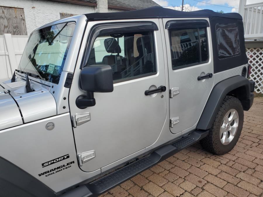 2011 Jeep Wrangler Unlimited 4WD 4dr Sport, available for sale in West Babylon, New York | SGM Auto Sales. West Babylon, New York 2011 Jeep Wrangler Unlimited 4WD 4dr Sport, available for sale in West Babylon, New York | SGM Auto Sales. West Babylon, New York
