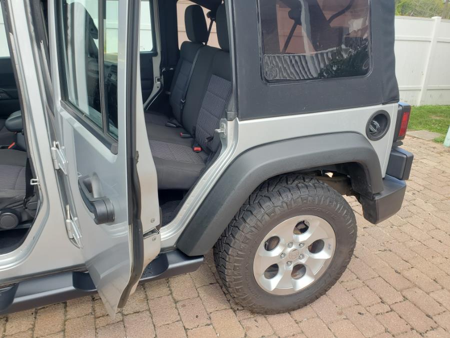 2011 Jeep Wrangler Unlimited 4WD 4dr Sport, available for sale in West Babylon, New York | SGM Auto Sales. West Babylon, New York 2011 Jeep Wrangler Unlimited 4WD 4dr Sport, available for sale in West Babylon, New York | SGM Auto Sales. West Babylon, New York