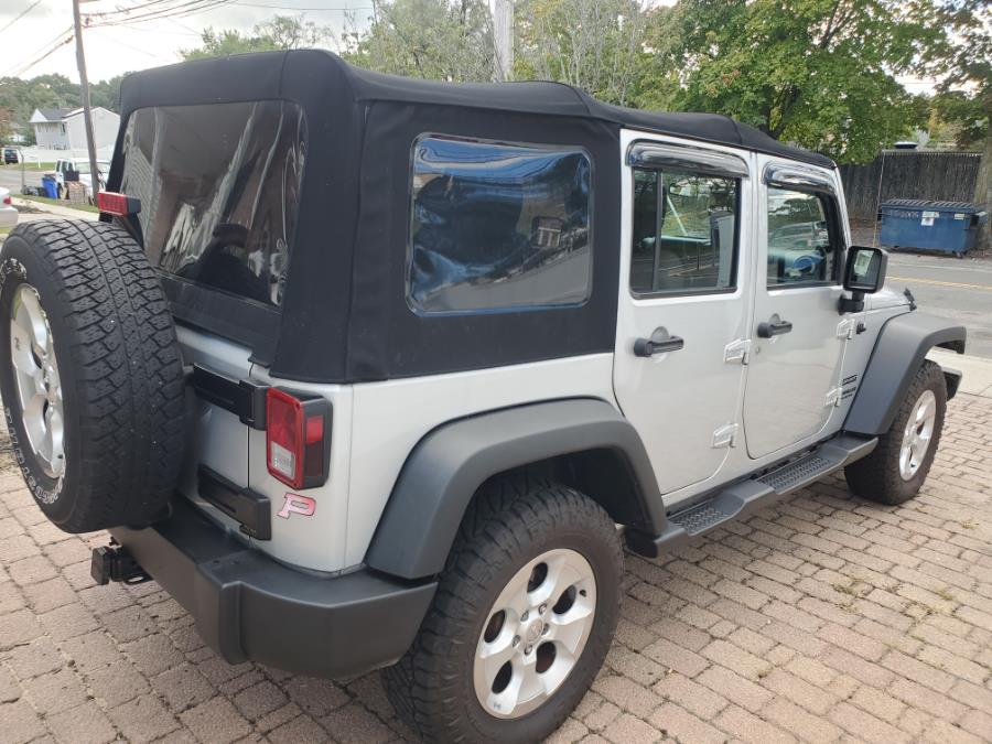 2011 Jeep Wrangler Unlimited 4WD 4dr Sport, available for sale in West Babylon, New York | SGM Auto Sales. West Babylon, New York 2011 Jeep Wrangler Unlimited 4WD 4dr Sport, available for sale in West Babylon, New York | SGM Auto Sales. West Babylon, New York