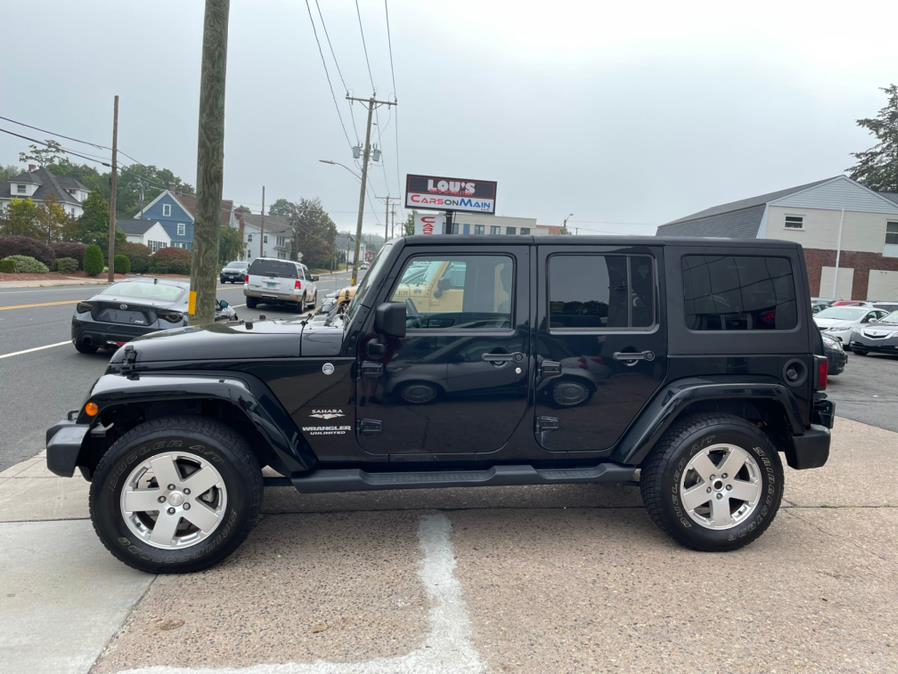 2011 Jeep Wrangler Unlimited 4WD 4dr Sahara, available for sale in Manchester, Connecticut | Carsonmain LLC. Manchester, Connecticut 2011 Jeep Wrangler Unlimited 4WD 4dr Sahara, available for sale in Manchester, Connecticut | Carsonmain LLC. Manchester, Connecticut