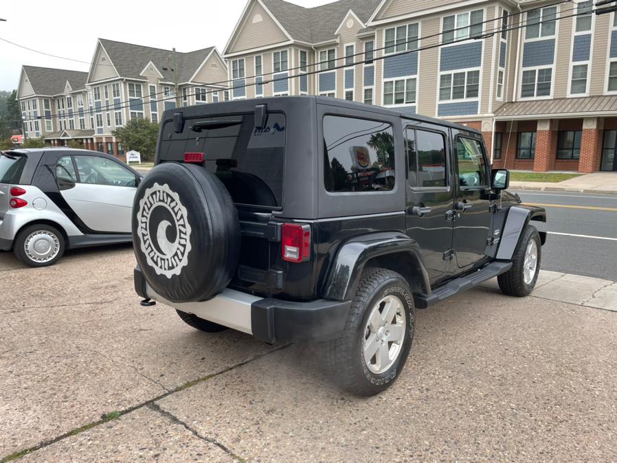2011 Jeep Wrangler Unlimited 4WD 4dr Sahara, available for sale in Manchester, Connecticut | Carsonmain LLC. Manchester, Connecticut 2011 Jeep Wrangler Unlimited 4WD 4dr Sahara, available for sale in Manchester, Connecticut | Carsonmain LLC. Manchester, Connecticut