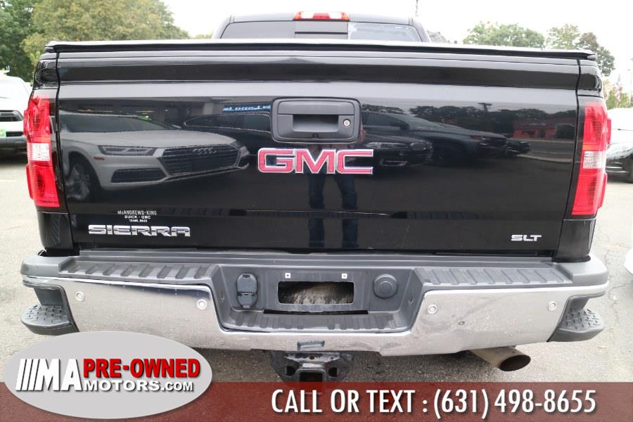 Used GMC Sierra 2500HD 4WD Double Cab 144.2" SLT 2015 | M & A Motors. Huntington, New York Used GMC Sierra 2500HD 4WD Double Cab 144.2" SLT 2015 | M & A Motors. Huntington, New York