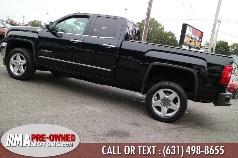 Used GMC Sierra 2500HD 4WD Double Cab 144.2" SLT 2015 | M & A Motors. Huntington, New York Used GMC Sierra 2500HD 4WD Double Cab 144.2" SLT 2015 | M & A Motors. Huntington, New York