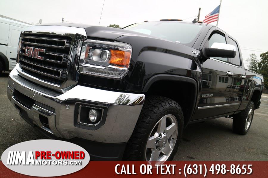 Used GMC Sierra 2500HD 4WD Double Cab 144.2" SLT 2015 | M & A Motors. Huntington, New York Used GMC Sierra 2500HD 4WD Double Cab 144.2" SLT 2015 | M & A Motors. Huntington, New York