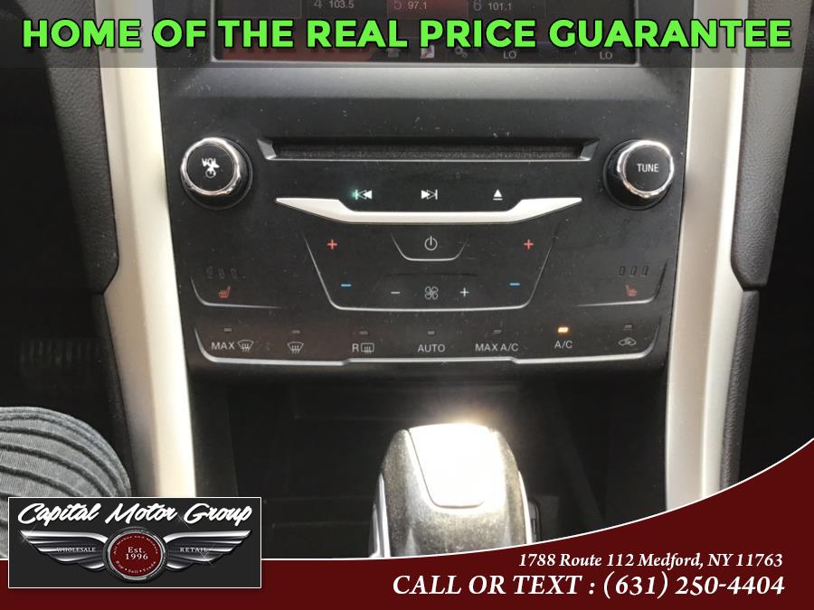 Used Ford Fusion Energi 4dr Sdn SE Luxury 2014 | Capital Motor Group Inc. Medford, New York Used Ford Fusion Energi 4dr Sdn SE Luxury 2014 | Capital Motor Group Inc. Medford, New York
