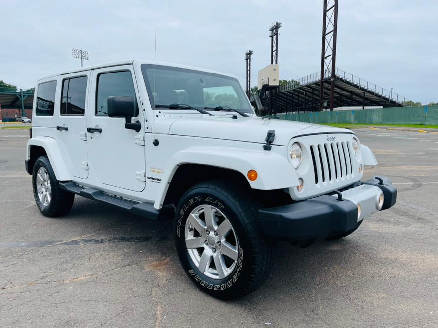 2014 Jeep Wrangler Unlimited 4WD 4dr Sahara, available for sale in New Britain, Connecticut | Supreme Automotive. New Britain, Connecticut