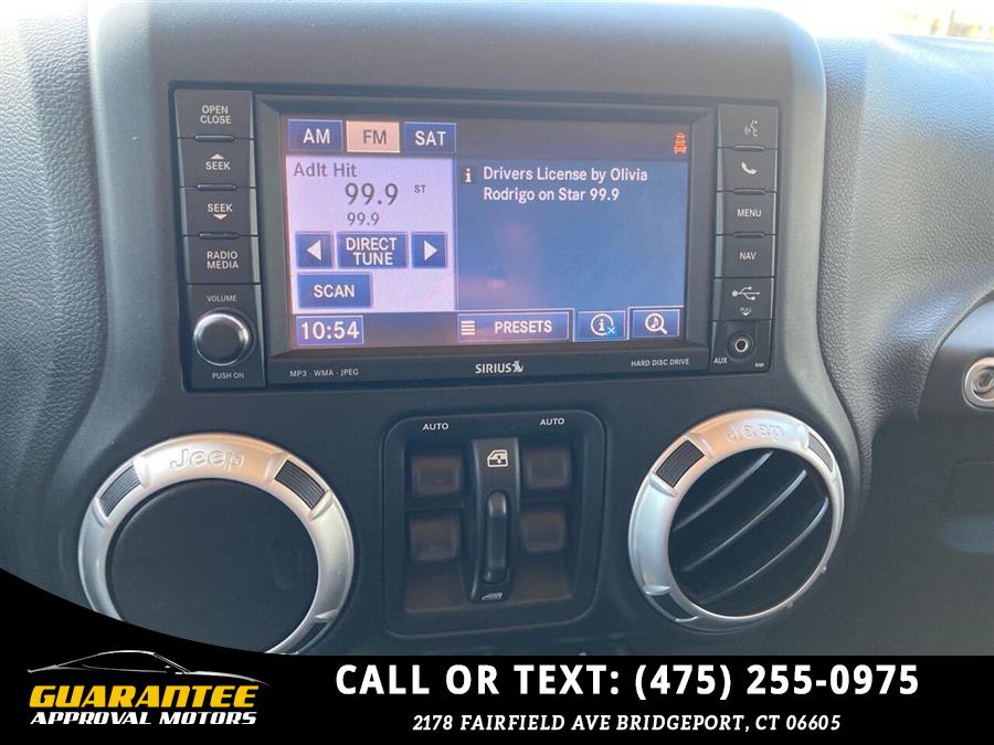 Used Jeep Wrangler Unlimited Sahara 4x4 4dr SUV 2012 | Guarantee Approval Motors. Bridgeport, Connecticut Used Jeep Wrangler Unlimited Sahara 4x4 4dr SUV 2012 | Guarantee Approval Motors. Bridgeport, Connecticut