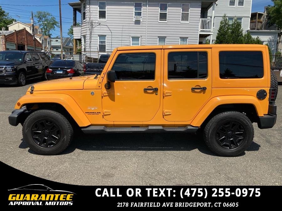 Used Jeep Wrangler Unlimited Sahara 4x4 4dr SUV 2012 | Guarantee Approval Motors. Bridgeport, Connecticut Used Jeep Wrangler Unlimited Sahara 4x4 4dr SUV 2012 | Guarantee Approval Motors. Bridgeport, Connecticut