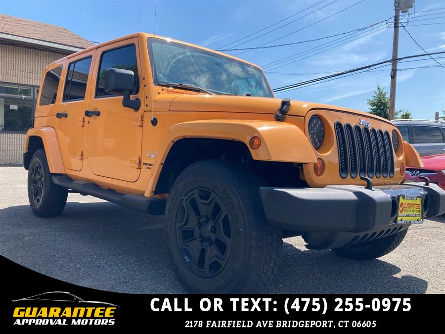 Used Jeep Wrangler Unlimited Sahara 4x4 4dr SUV 2012 | Guarantee Approval Motors. Bridgeport, Connecticut Used Jeep Wrangler Unlimited Sahara 4x4 4dr SUV 2012 | Guarantee Approval Motors. Bridgeport, Connecticut