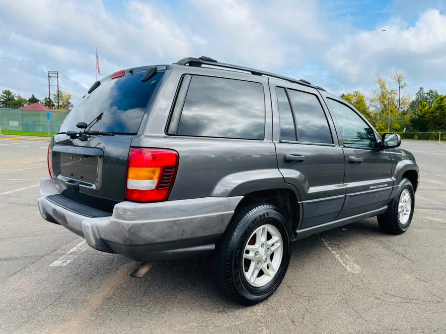 2004 Jeep Grand Cherokee 4dr Laredo 4WD, available for sale in New Britain, Connecticut | Supreme Automotive. New Britain, Connecticut 2004 Jeep Grand Cherokee 4dr Laredo 4WD, available for sale in New Britain, Connecticut | Supreme Automotive. New Britain, Connecticut