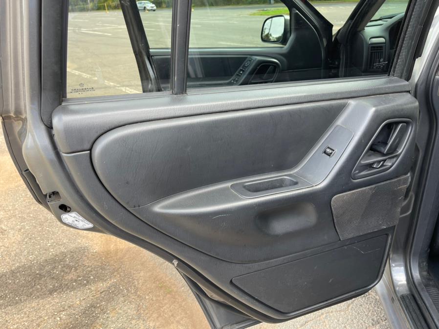 2004 Jeep Grand Cherokee 4dr Laredo 4WD, available for sale in New Britain, Connecticut | Supreme Automotive. New Britain, Connecticut 2004 Jeep Grand Cherokee 4dr Laredo 4WD, available for sale in New Britain, Connecticut | Supreme Automotive. New Britain, Connecticut