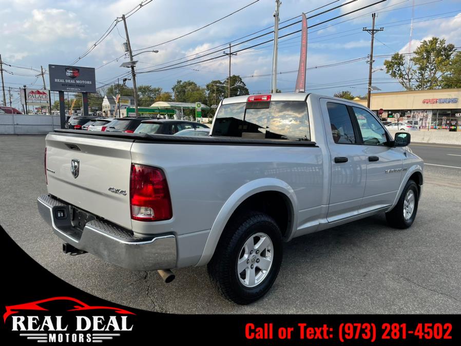 Used Ram 1500 4WD Quad Cab 140.5" SLT 2012 | Real Deal Motors. Lodi, New Jersey Used Ram 1500 4WD Quad Cab 140.5" SLT 2012 | Real Deal Motors. Lodi, New Jersey