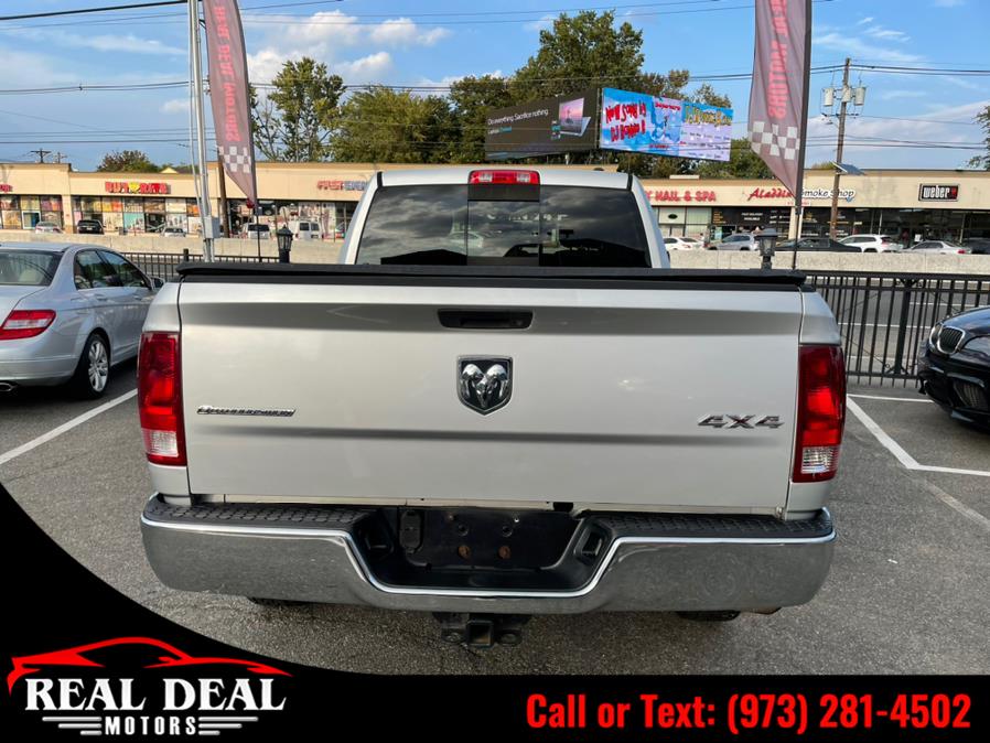 Used Ram 1500 4WD Quad Cab 140.5" SLT 2012 | Real Deal Motors. Lodi, New Jersey Used Ram 1500 4WD Quad Cab 140.5" SLT 2012 | Real Deal Motors. Lodi, New Jersey