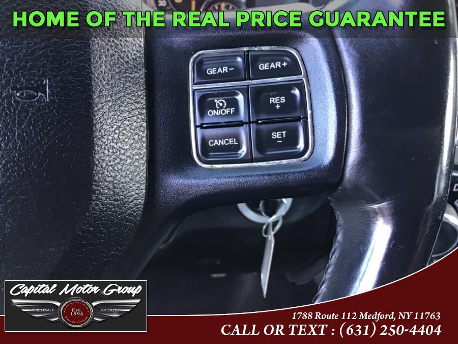 Used Ram 1500 4WD Quad Cab 140.5" SLT 2013 | Capital Motor Group Inc. Medford, New York Used Ram 1500 4WD Quad Cab 140.5" SLT 2013 | Capital Motor Group Inc. Medford, New York