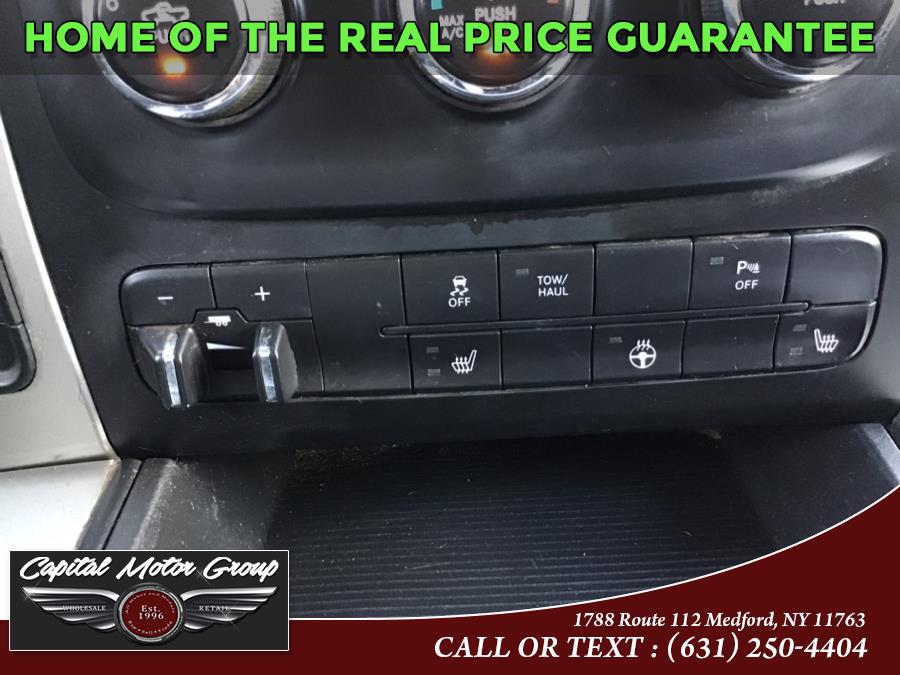 Used Ram 1500 4WD Quad Cab 140.5" SLT 2013 | Capital Motor Group Inc. Medford, New York Used Ram 1500 4WD Quad Cab 140.5" SLT 2013 | Capital Motor Group Inc. Medford, New York