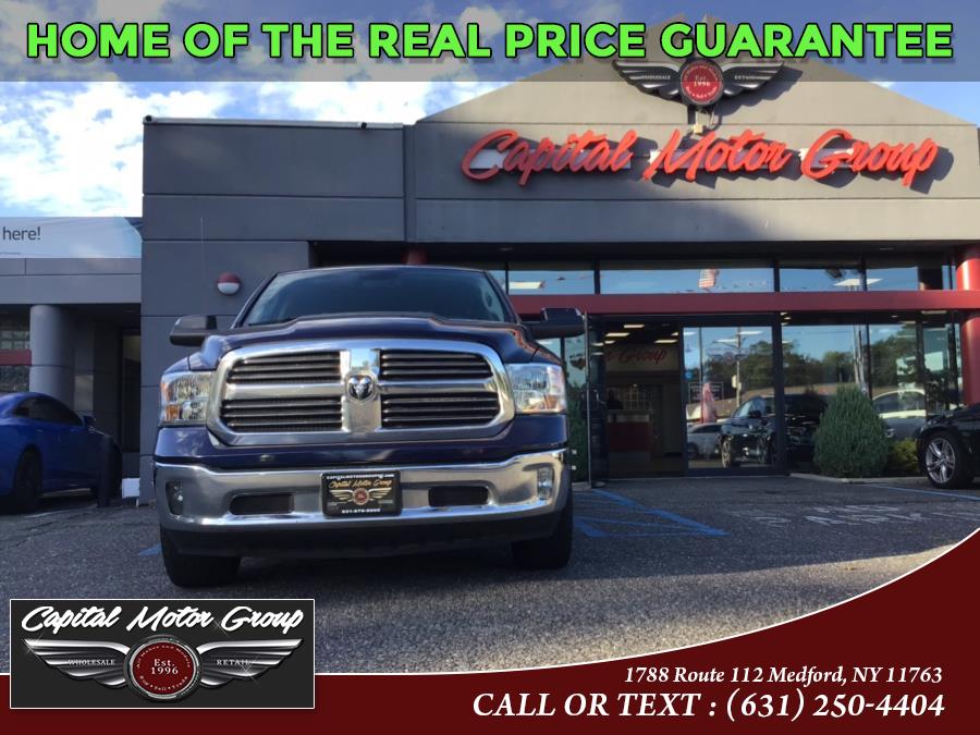 Used Ram 1500 4WD Quad Cab 140.5" SLT 2013 | Capital Motor Group Inc. Medford, New York Used Ram 1500 4WD Quad Cab 140.5" SLT 2013 | Capital Motor Group Inc. Medford, New York