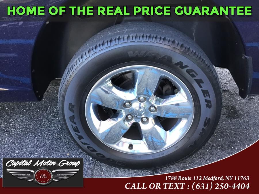 Used Ram 1500 4WD Quad Cab 140.5" SLT 2013 | Capital Motor Group Inc. Medford, New York Used Ram 1500 4WD Quad Cab 140.5" SLT 2013 | Capital Motor Group Inc. Medford, New York