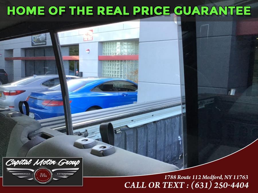 Used Ram 1500 4WD Quad Cab 140.5" SLT 2013 | Capital Motor Group Inc. Medford, New York Used Ram 1500 4WD Quad Cab 140.5" SLT 2013 | Capital Motor Group Inc. Medford, New York
