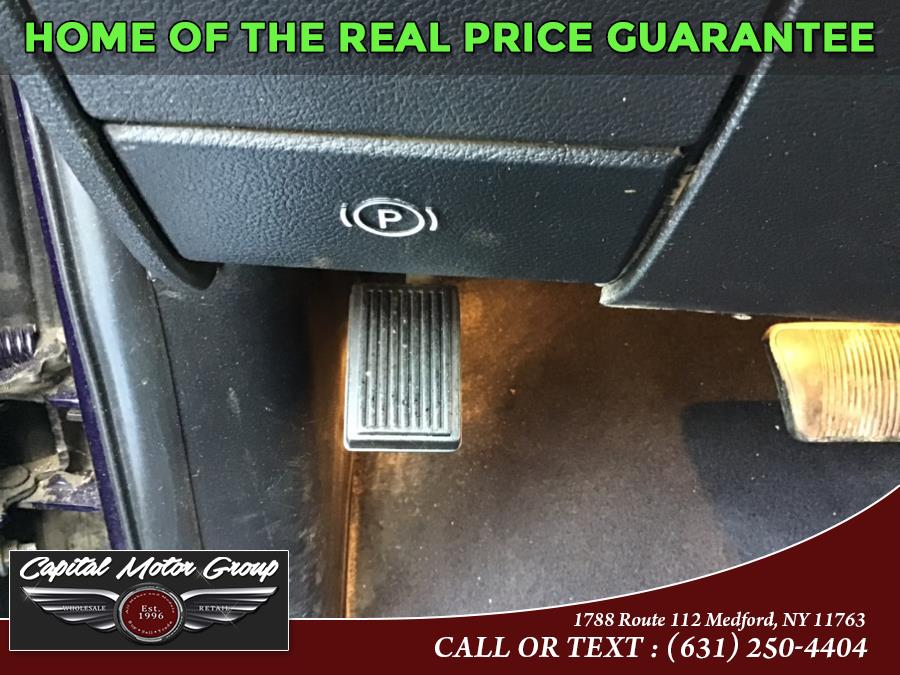 Used Ram 1500 4WD Quad Cab 140.5" SLT 2013 | Capital Motor Group Inc. Medford, New York Used Ram 1500 4WD Quad Cab 140.5" SLT 2013 | Capital Motor Group Inc. Medford, New York