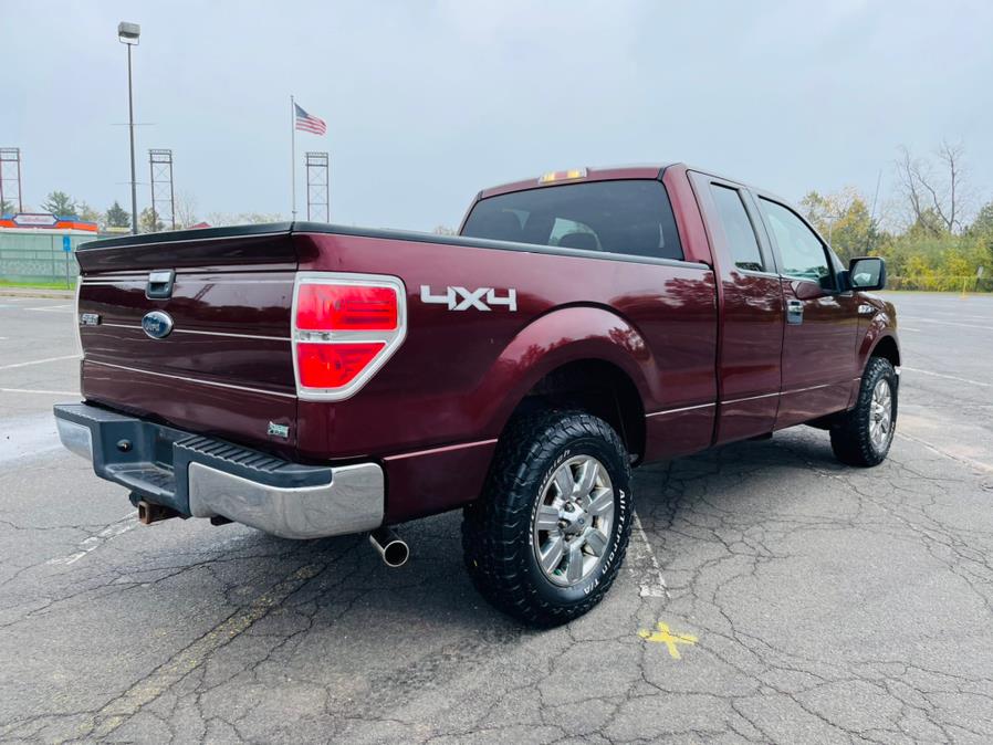 2010 Ford F-150 4WD SuperCab 145" XLT, available for sale in New Britain, Connecticut | Supreme Automotive. New Britain, Connecticut 2010 Ford F-150 4WD SuperCab 145" XLT, available for sale in New Britain, Connecticut | Supreme Automotive. New Britain, Connecticut