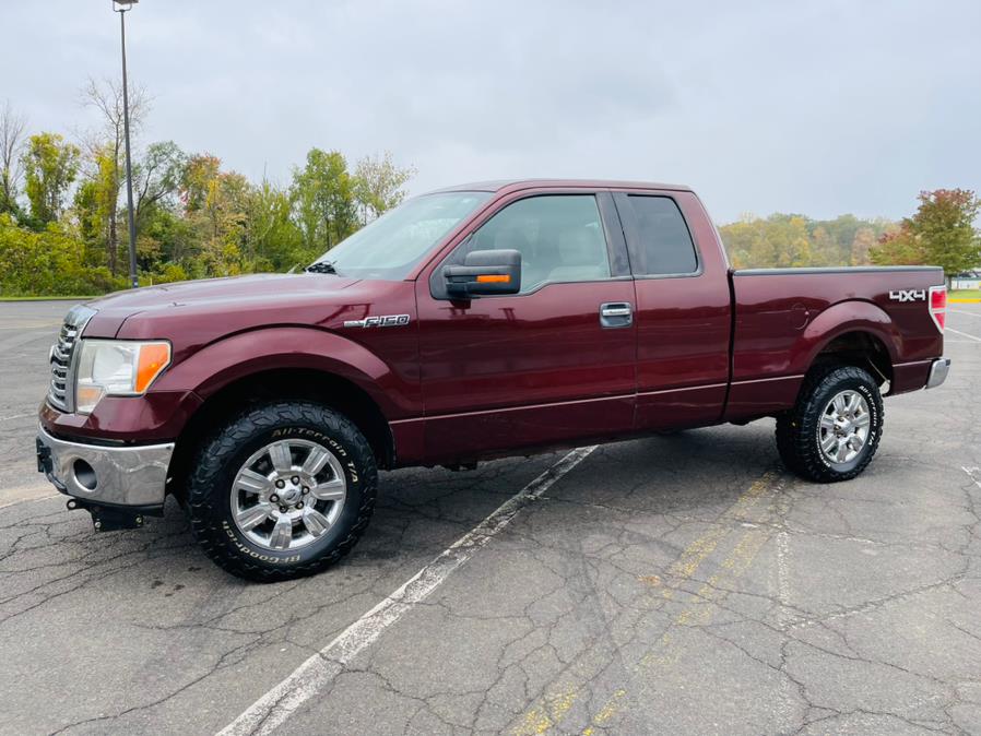 2010 Ford F-150 4WD SuperCab 145" XLT, available for sale in New Britain, Connecticut | Supreme Automotive. New Britain, Connecticut 2010 Ford F-150 4WD SuperCab 145" XLT, available for sale in New Britain, Connecticut | Supreme Automotive. New Britain, Connecticut