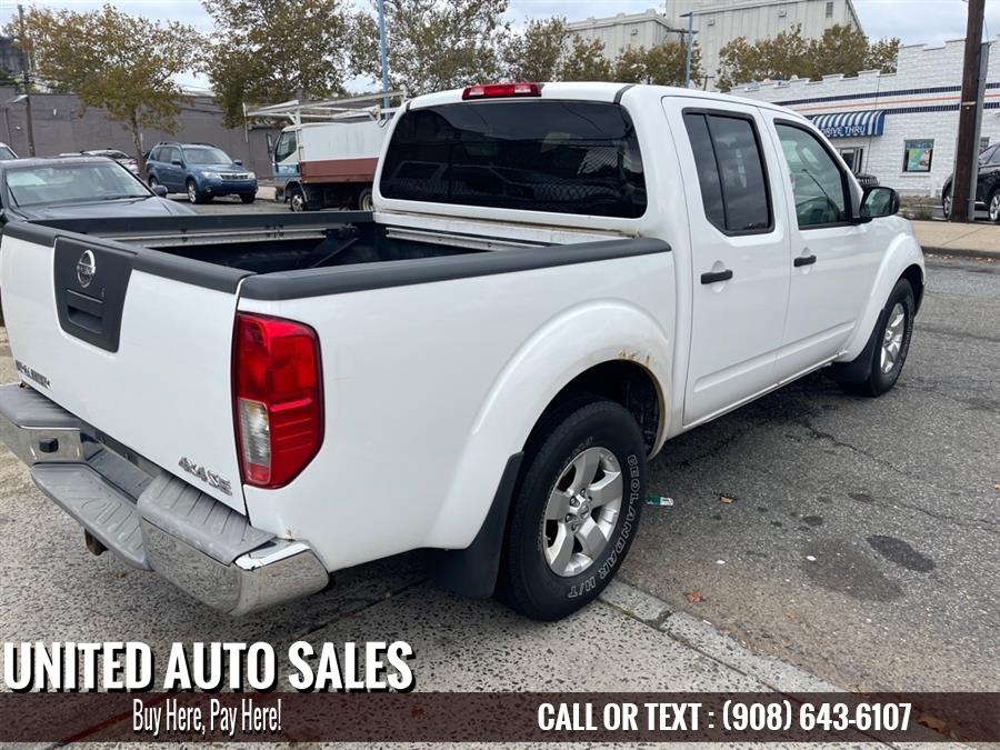 Used Nissan Frontier CREW CAB SE 2009 | United Auto Sale. Newark, New Jersey Used Nissan Frontier CREW CAB SE 2009 | United Auto Sale. Newark, New Jersey