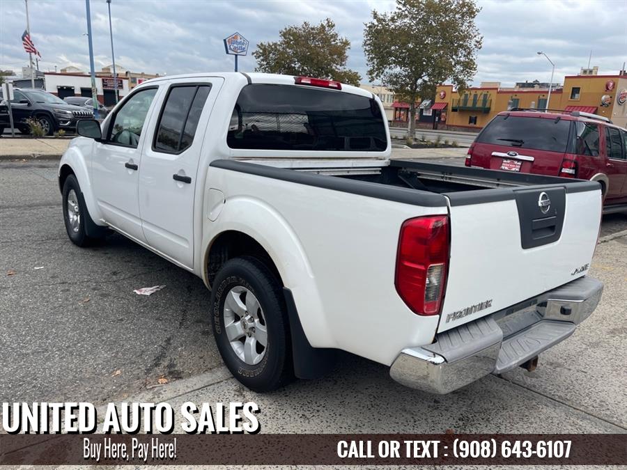 Used Nissan Frontier CREW CAB SE 2009 | United Auto Sale. Newark, New Jersey Used Nissan Frontier CREW CAB SE 2009 | United Auto Sale. Newark, New Jersey