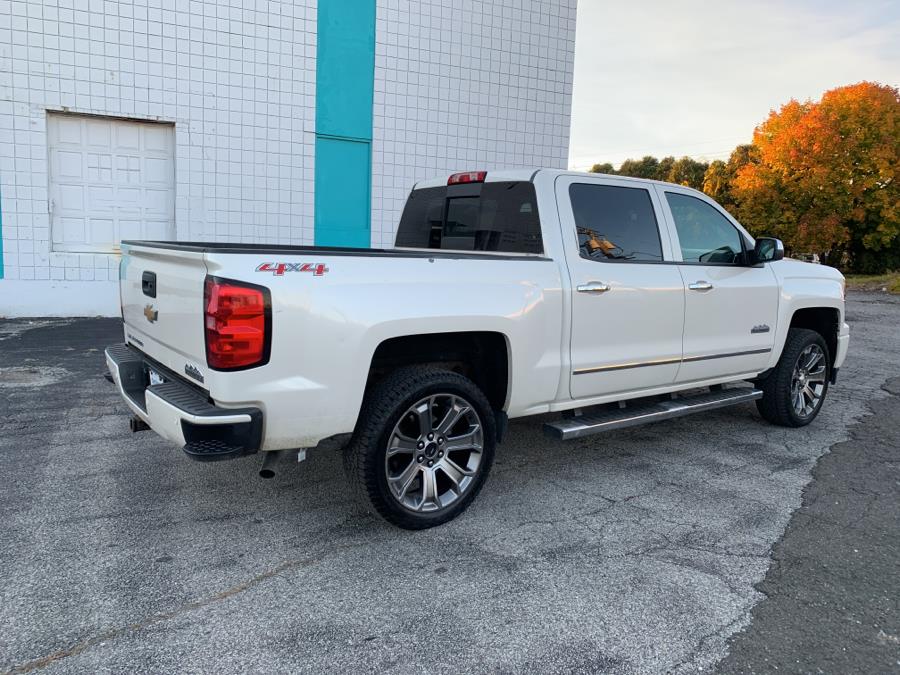 Used Chevrolet Silverado 1500 4WD Crew Cab 143.5" High Country 2014 | Dealertown Auto Wholesalers. Milford, Connecticut Used Chevrolet Silverado 1500 4WD Crew Cab 143.5" High Country 2014 | Dealertown Auto Wholesalers. Milford, Connecticut