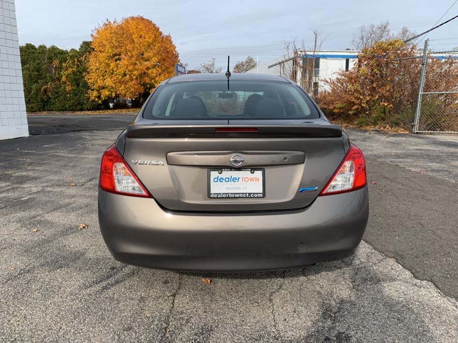 2014 Nissan Versa 4dr Sdn CVT 1.6 SV, available for sale in Milford, Connecticut | Dealertown Auto Wholesalers. Milford, Connecticut 2014 Nissan Versa 4dr Sdn CVT 1.6 SV, available for sale in Milford, Connecticut | Dealertown Auto Wholesalers. Milford, Connecticut