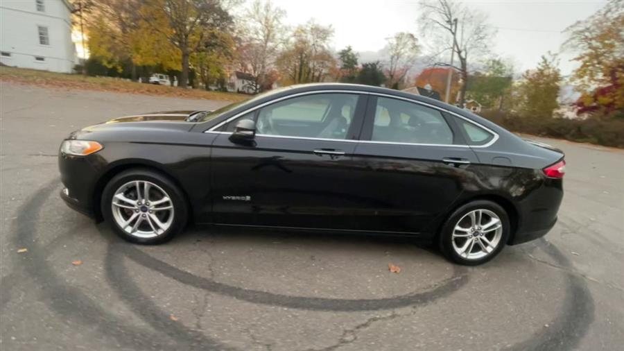 Used Ford Fusion 4dr Sdn Titanium Hybrid FWD 2015 | Wiz Leasing Inc. Stratford, Connecticut Used Ford Fusion 4dr Sdn Titanium Hybrid FWD 2015 | Wiz Leasing Inc. Stratford, Connecticut